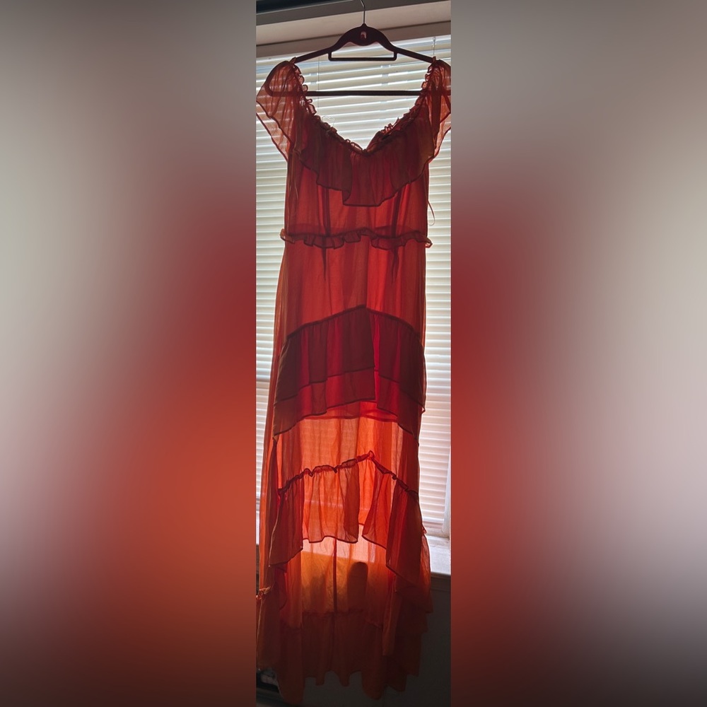 This is a gorgeous orange dress